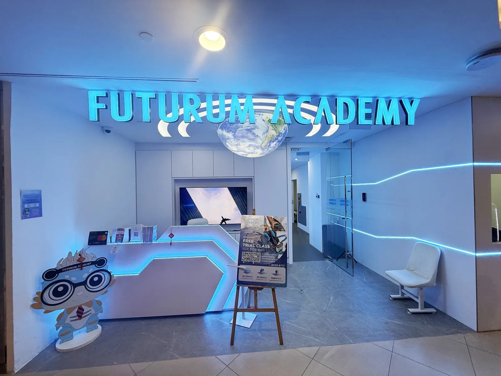 The LED-lit entrance of an OpenKids campus